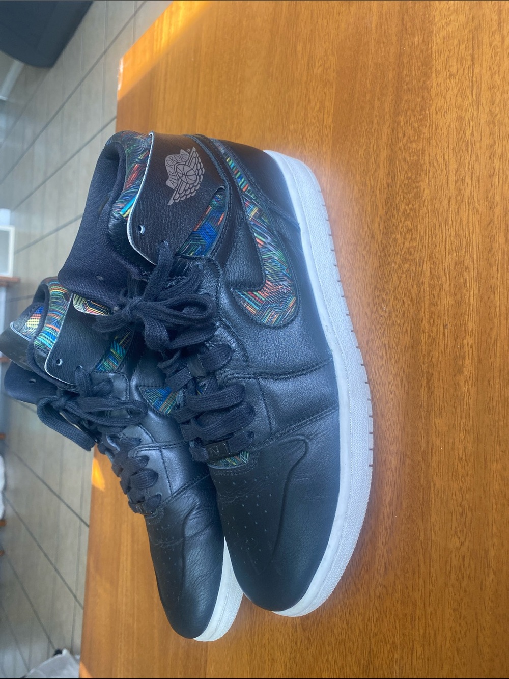 Jordan Black High-Top Sneakers with Multicolor Accents